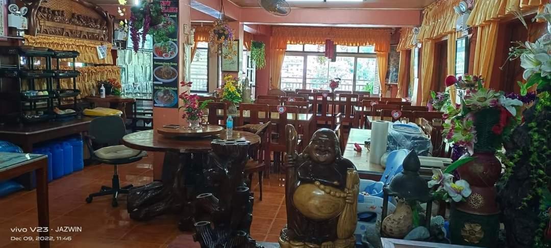 People'S Lodge And Restaurant Банаю Экстерьер фото