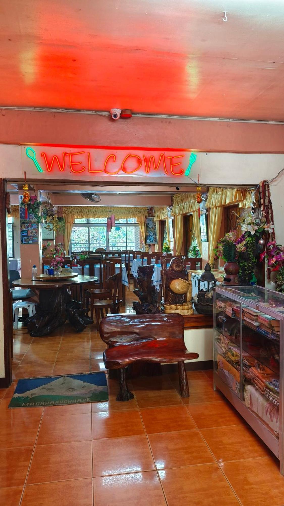 People'S Lodge And Restaurant Банаю Экстерьер фото