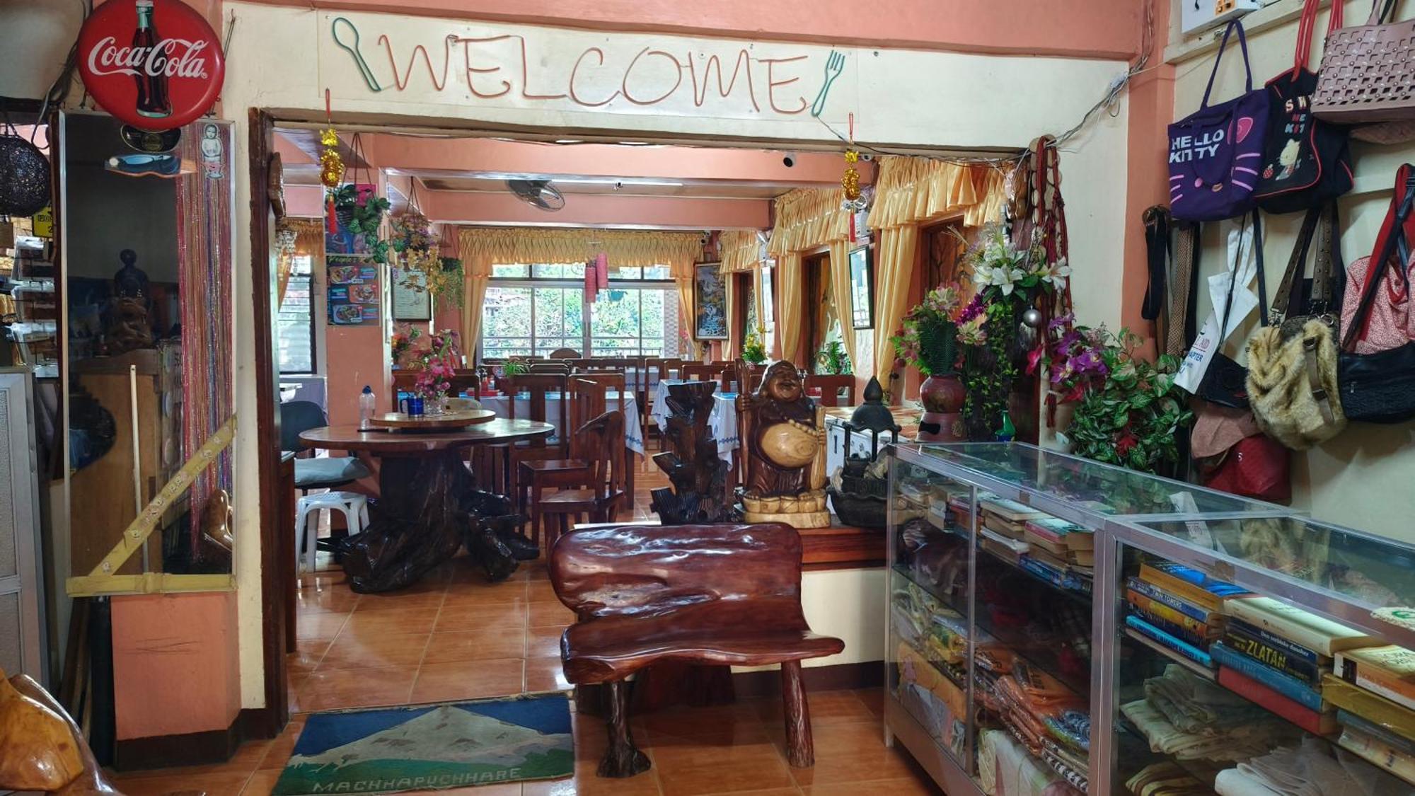 People'S Lodge And Restaurant Банаю Экстерьер фото